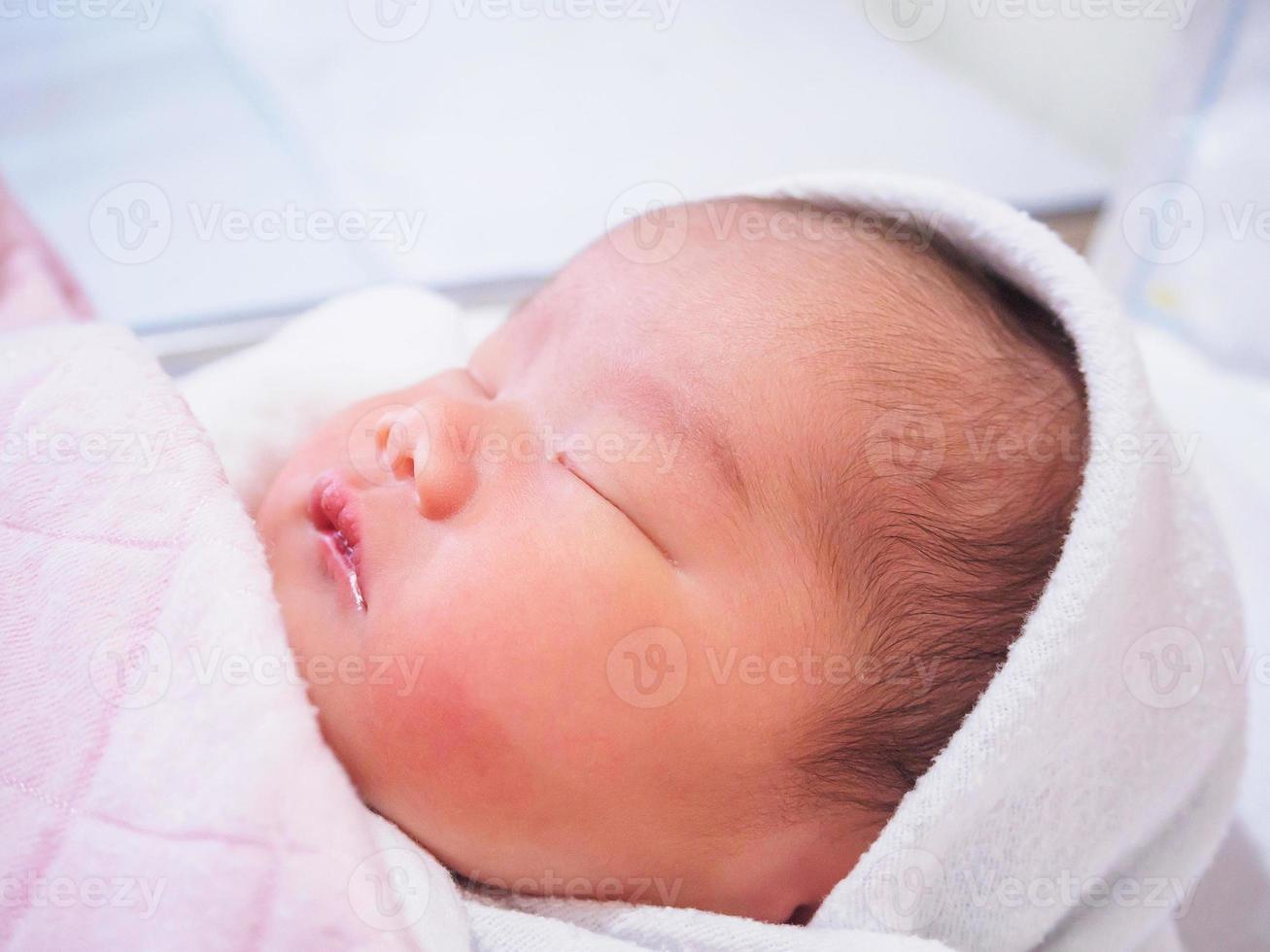 Cute newborn asian baby girl photo