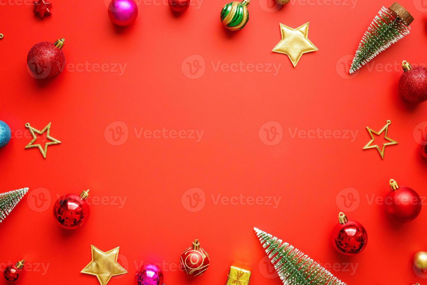Christmas new year holiday background pine tree ball bauble on red background photo