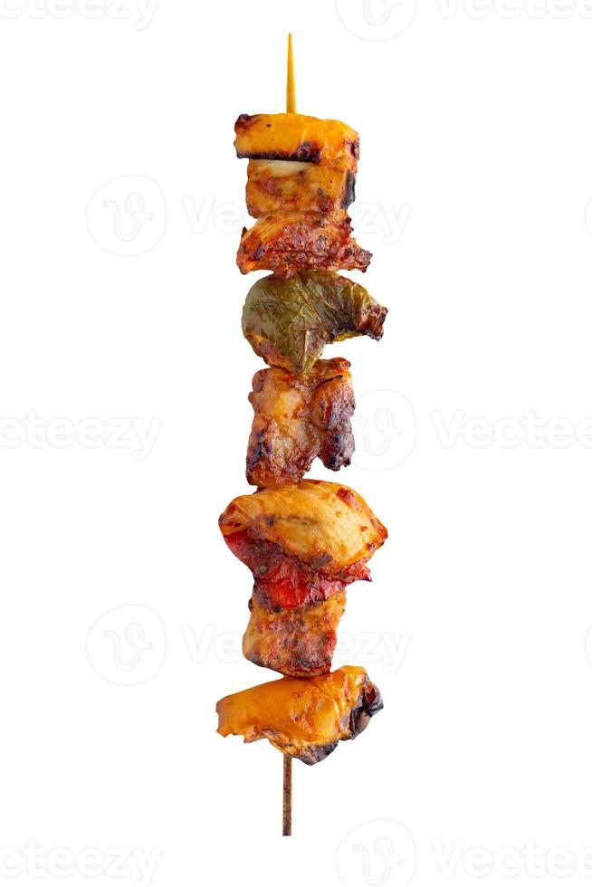 Grilled pork skewer and vegetables barbecue isolated on white background photo