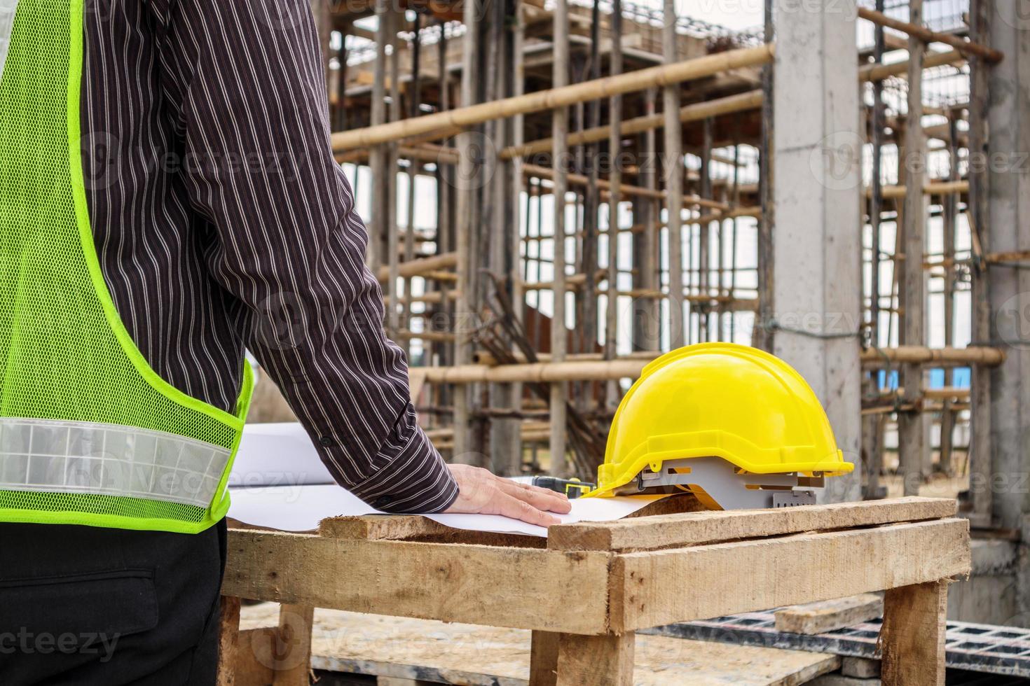 professional engineer worker at the house building construction site photo