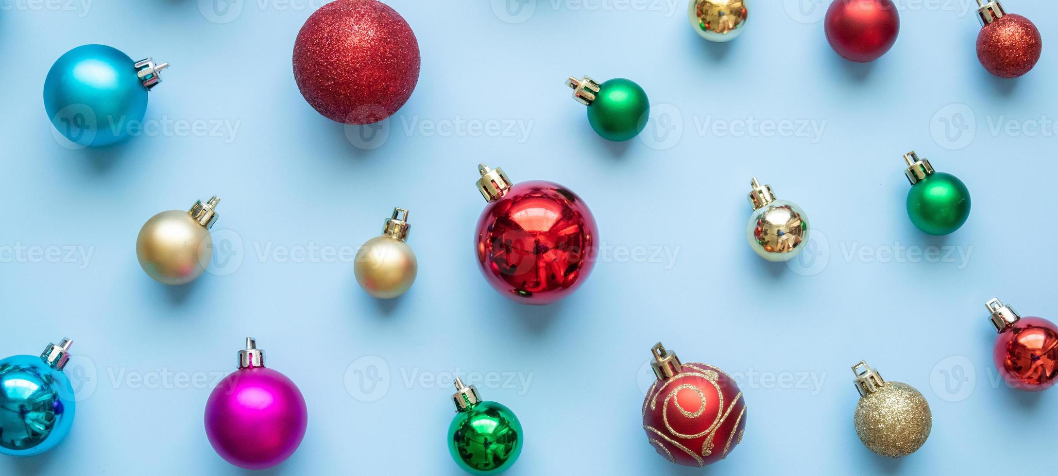 Christmas ball bauble pattern minimal flatlay on blue pastel background top view photo