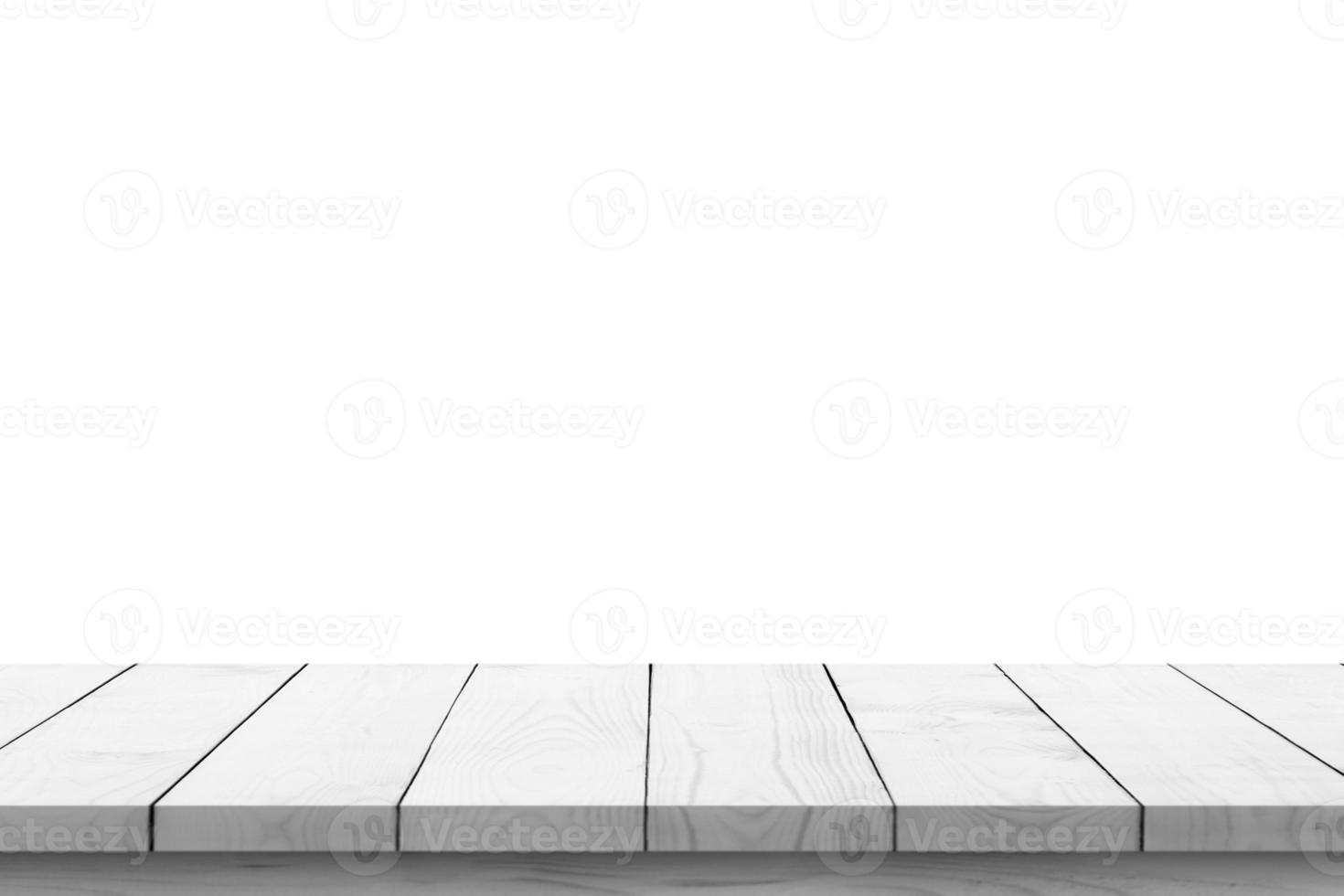 Empty white wooden table top isolated on white background photo