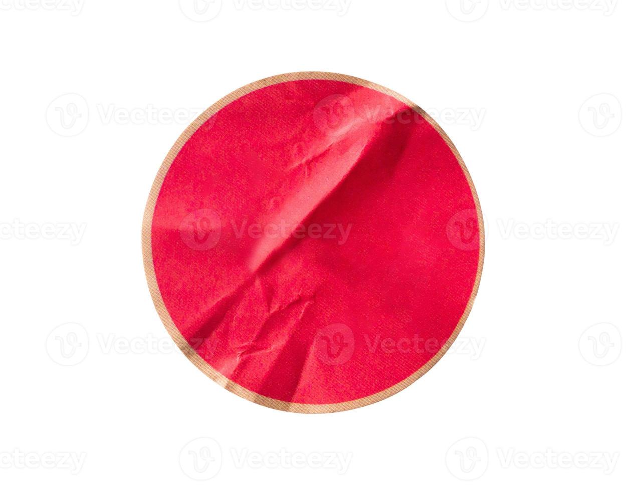 Blank red round adhesive paper sticker label isolated on white background photo