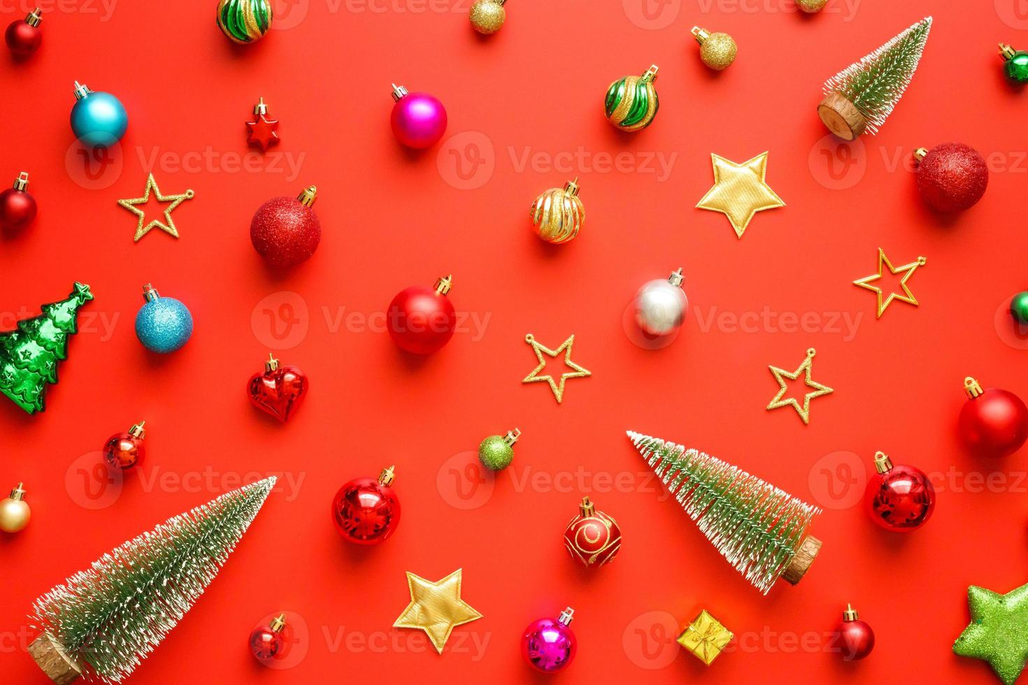 Christmas new year holiday background pine tree ball bauble on red background photo