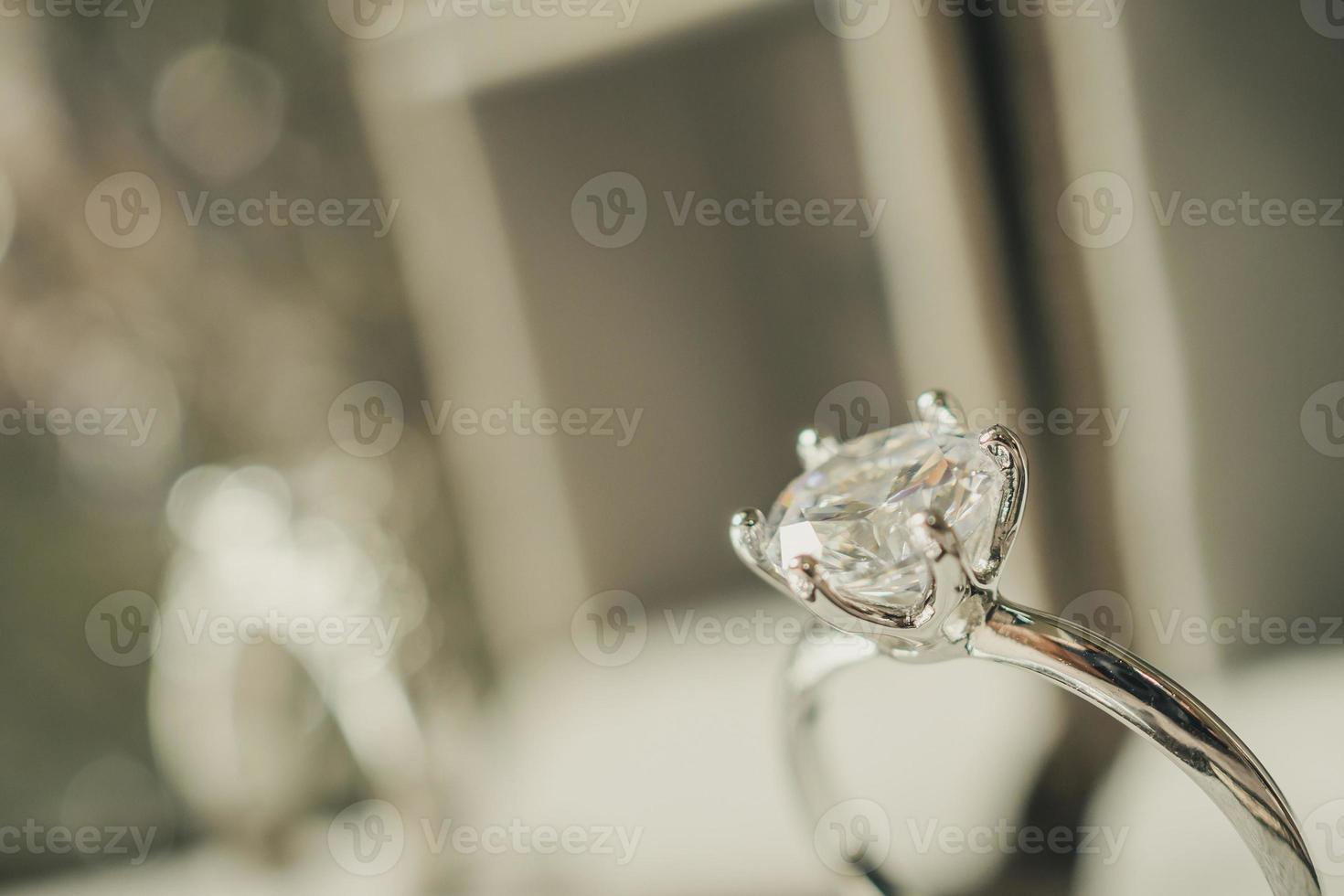 luxury engagement Diamond ring in jewelry gift box with bokeh light