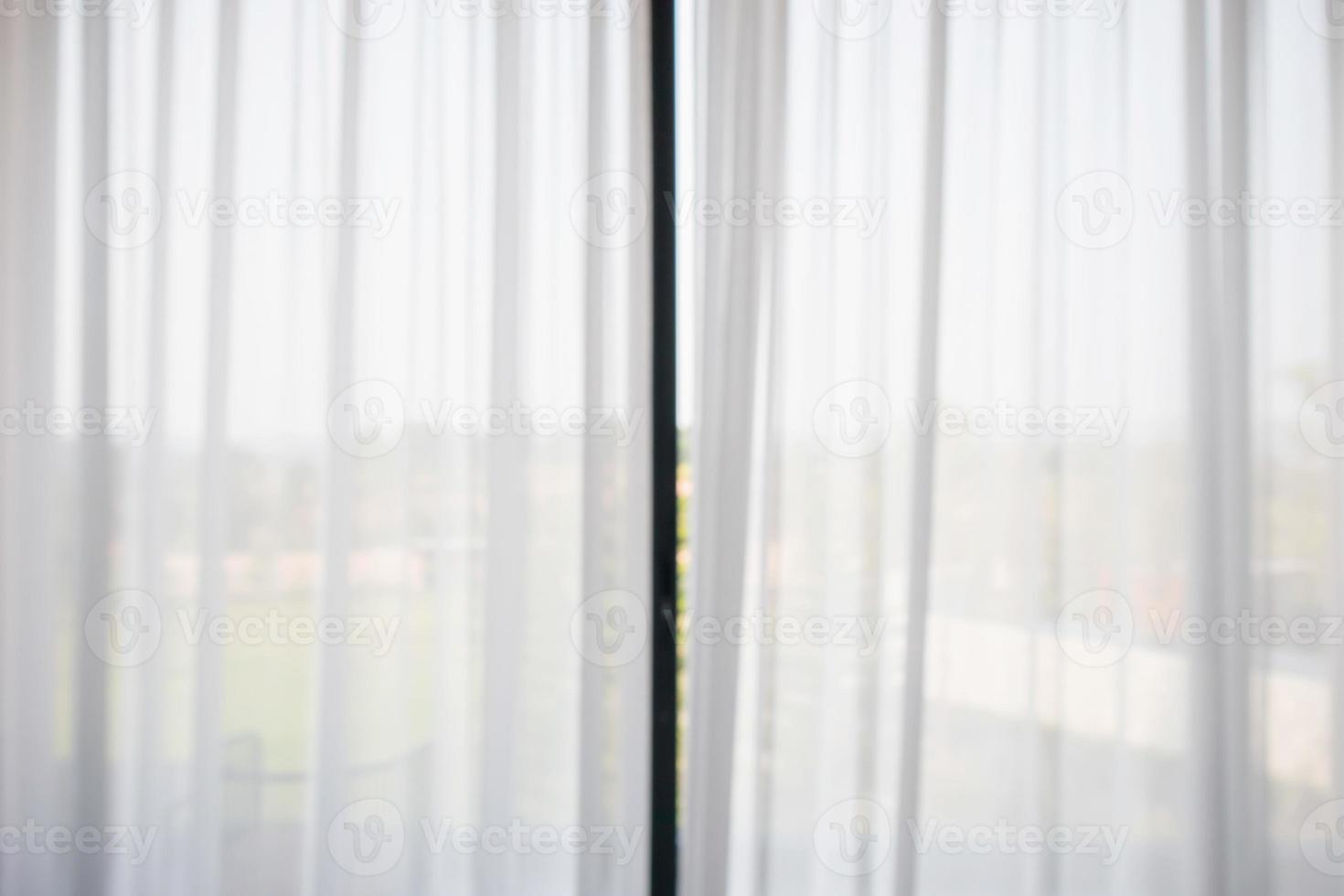window curtain with green garden abstract blur background photo