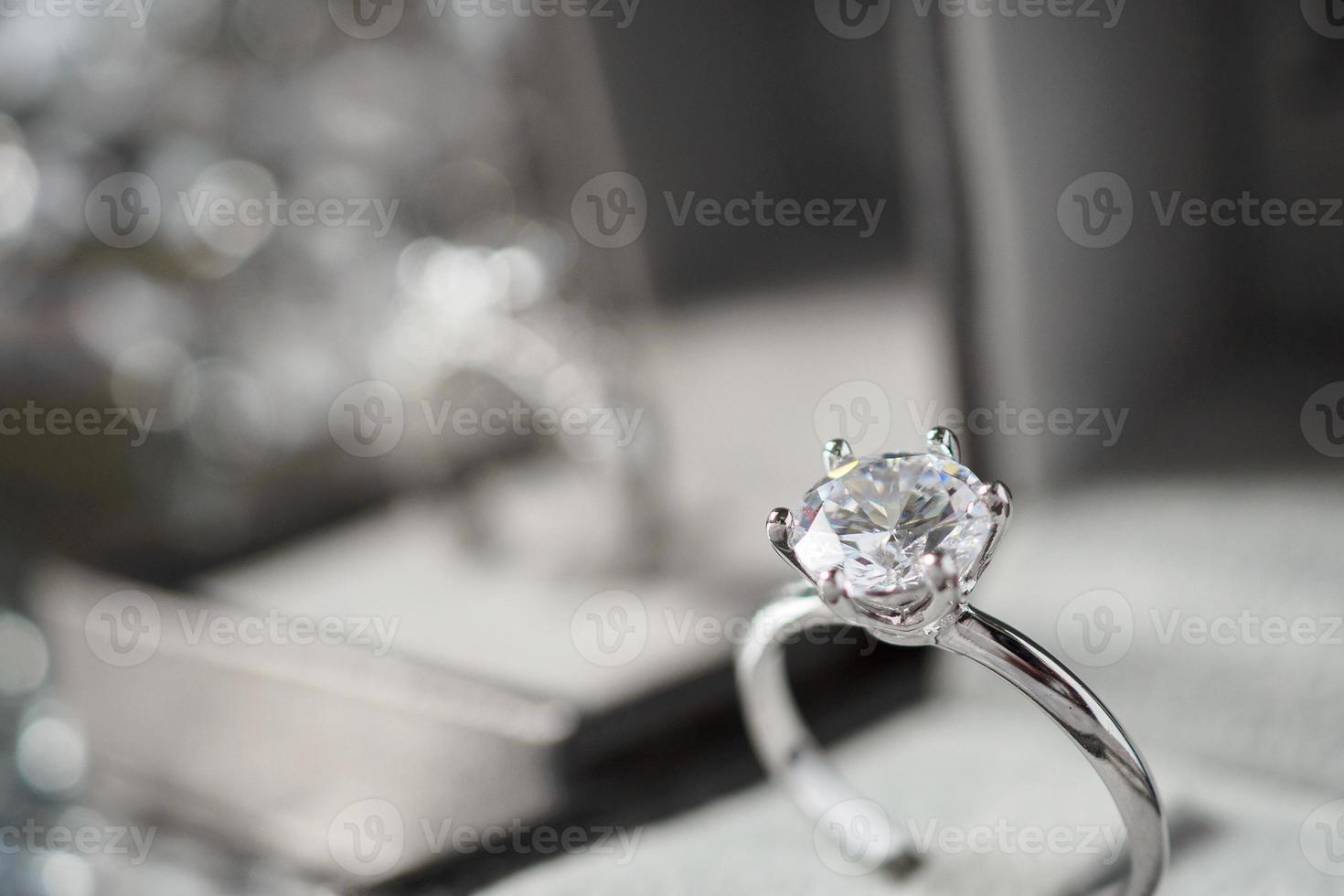 luxury engagement Diamond ring in jewelry gift box with bokeh light