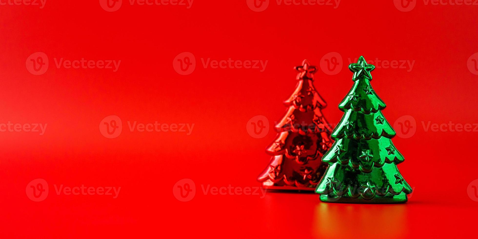 Christmas tree on red background new year  holiday celebration concept photo