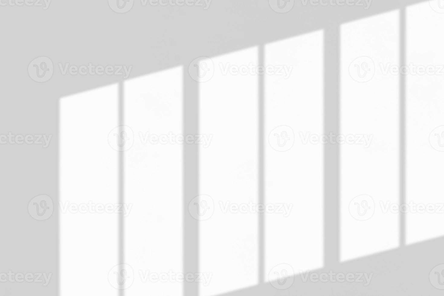 Window shadow drop on white wall background photo