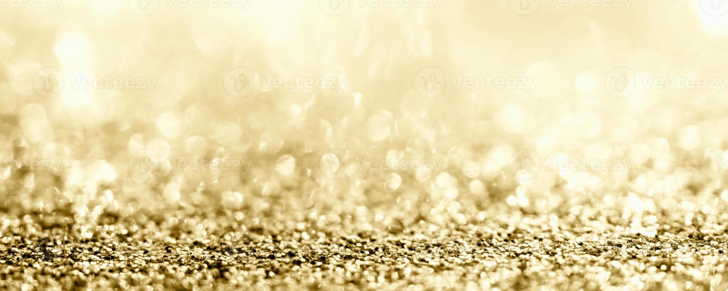 brillo de oro abstracto borroso con fondo bokeh foto