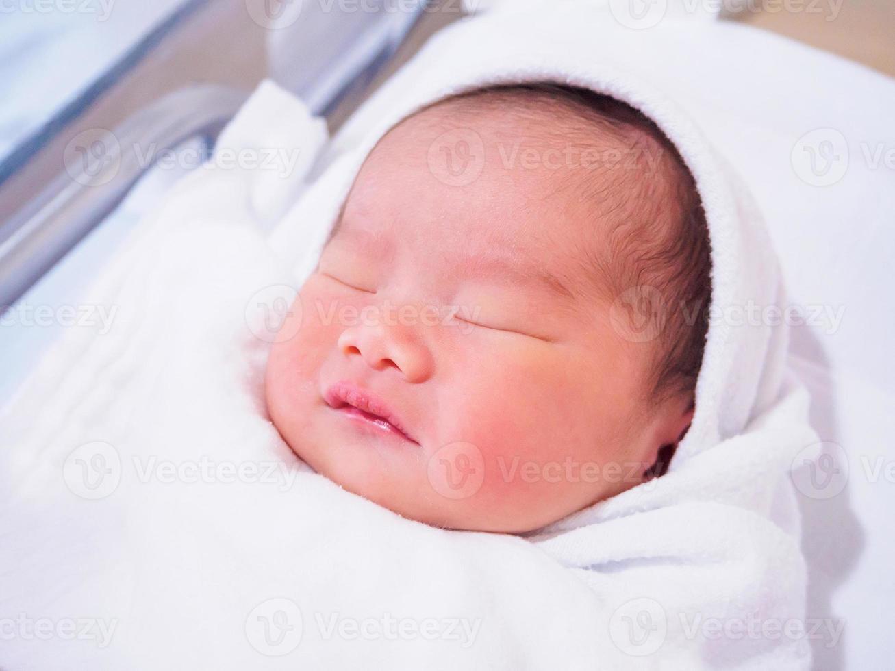 Cute newborn asian baby girl photo