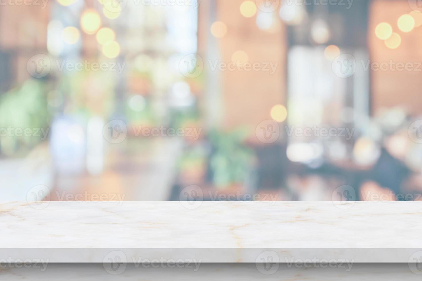 marble table top with blurred kitchen cafe restaurant interior