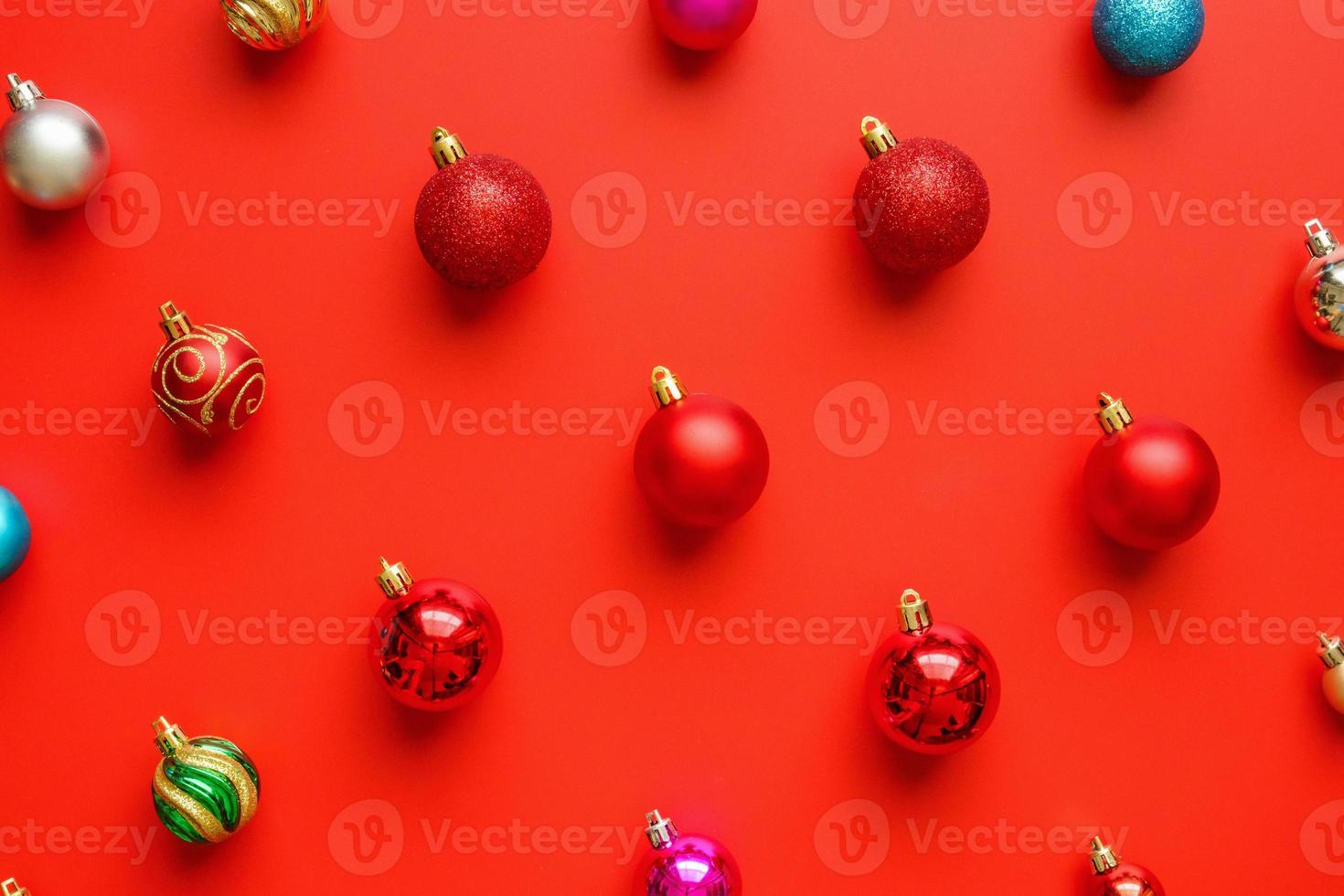 Christmas ball bauble pattern minimal flatlay on red background top view photo