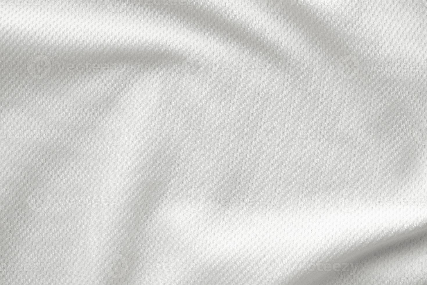 White sports clothing fabric jersey football shirt texture top view close up photo