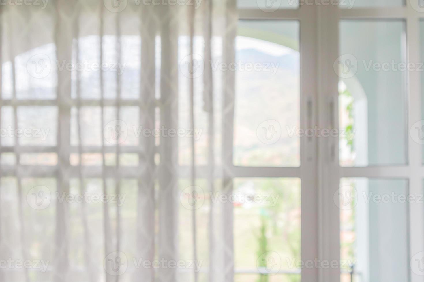 window curtain with green garden abstract blur background photo