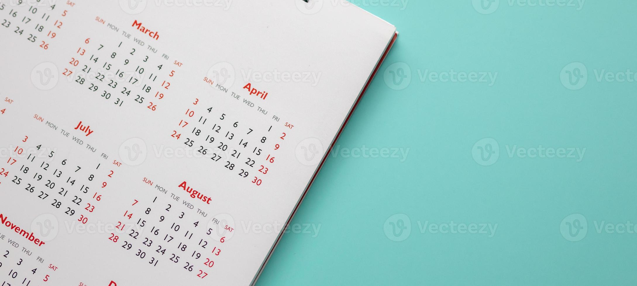calendar page on blue background business planning appointment meeting concept photo