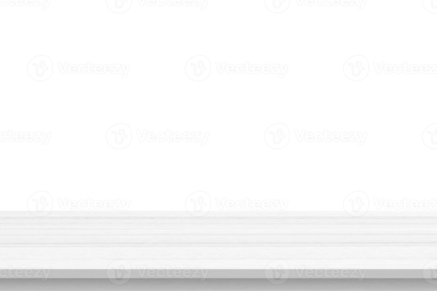 Empty white wooden table top isolated on white background photo