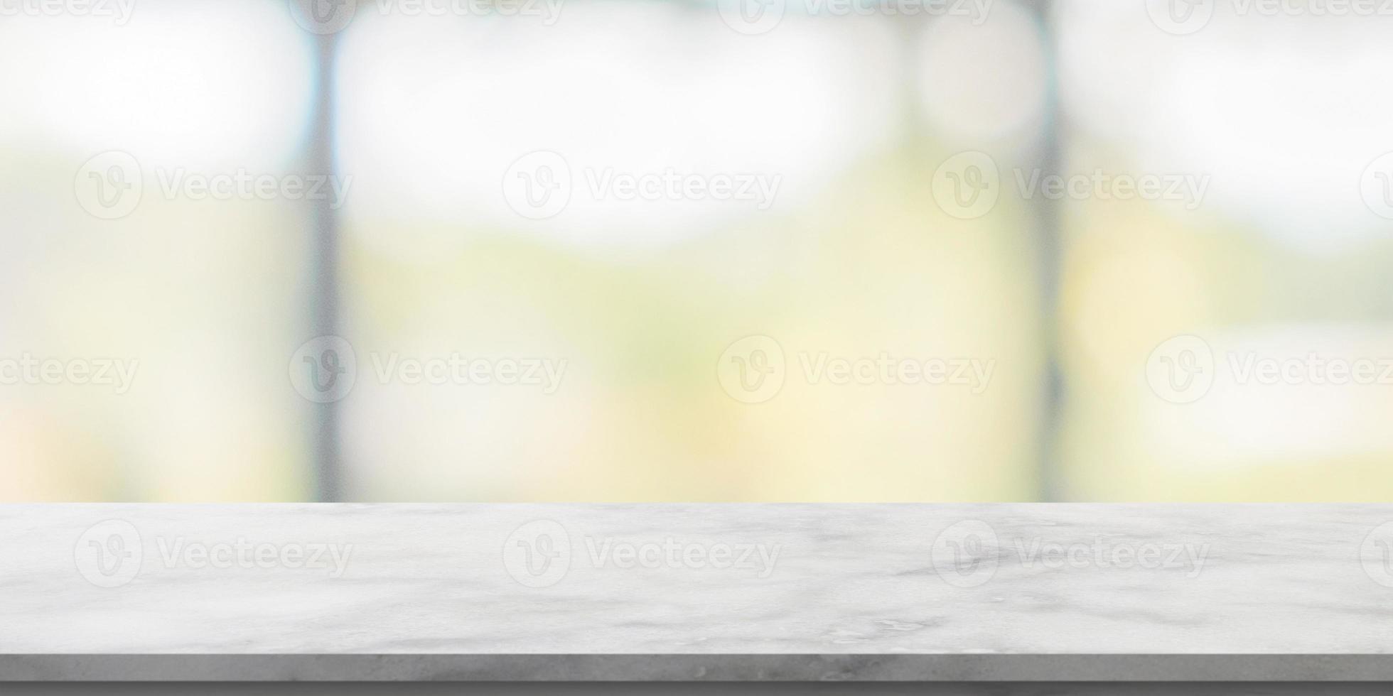 mesa de mármol con fondo interior de cocina cafetería restaurante borroso foto