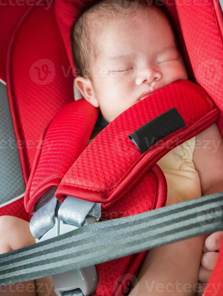 Newborn baby girl sleep in car seat 12812116 Stock Photo at Vecteezy