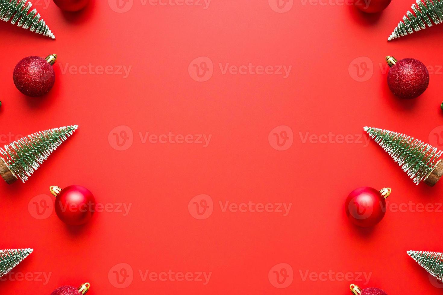 Christmas new year background pine tree ball bauble on red background photo