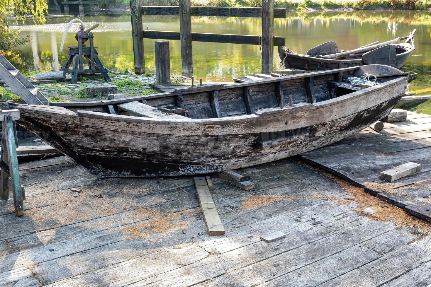 old boat in a warf photo