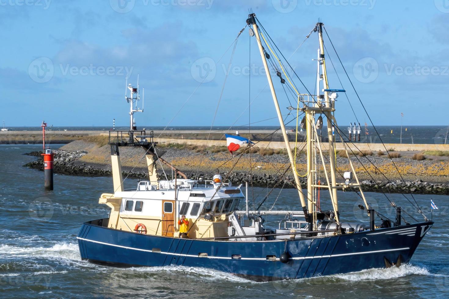 fishing boats in the harbor photo