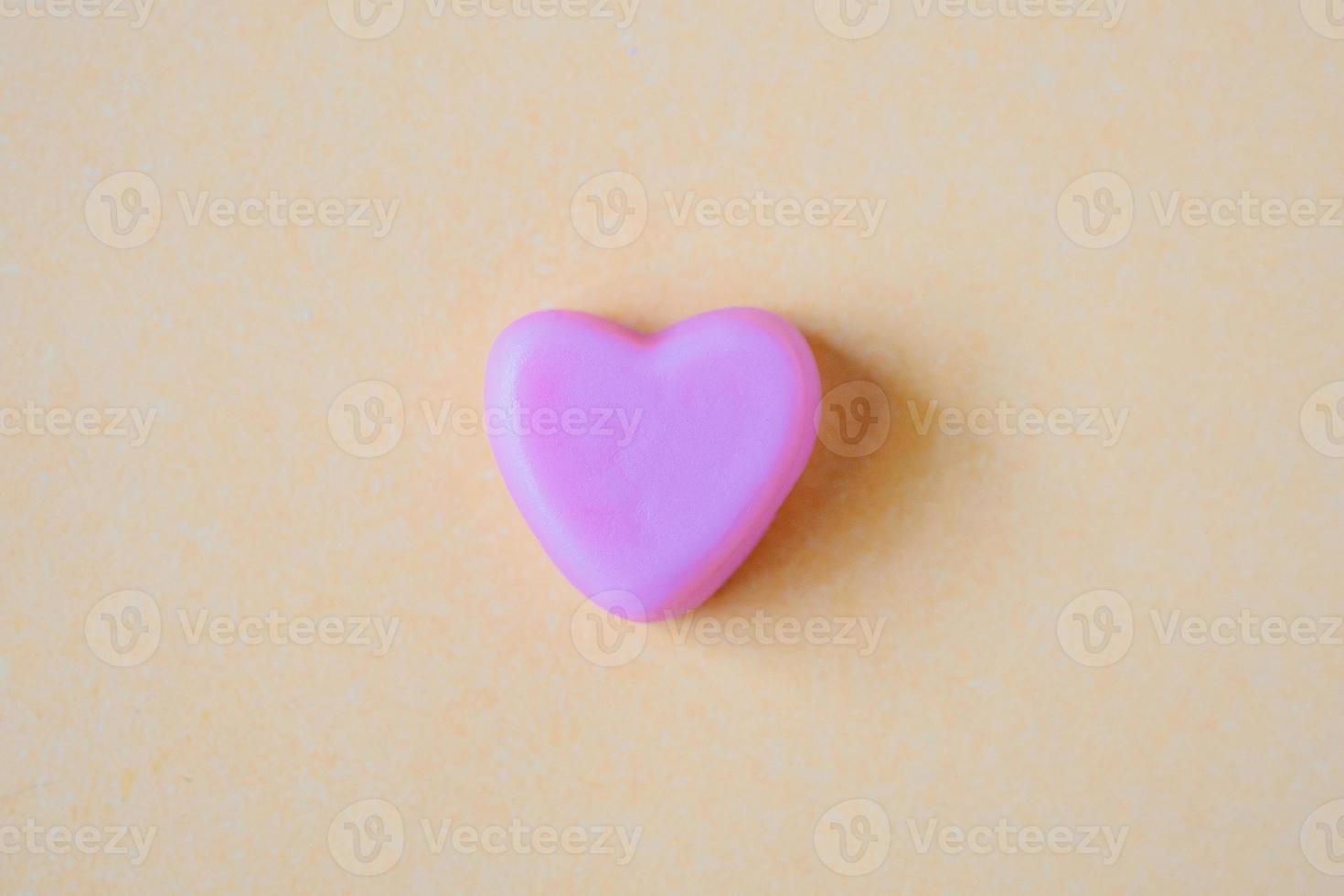 Valentines day background with heart shape candy photo