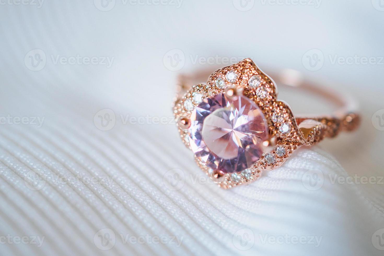 Jewelry luxury pink gold sapphire gemstone ring background photo