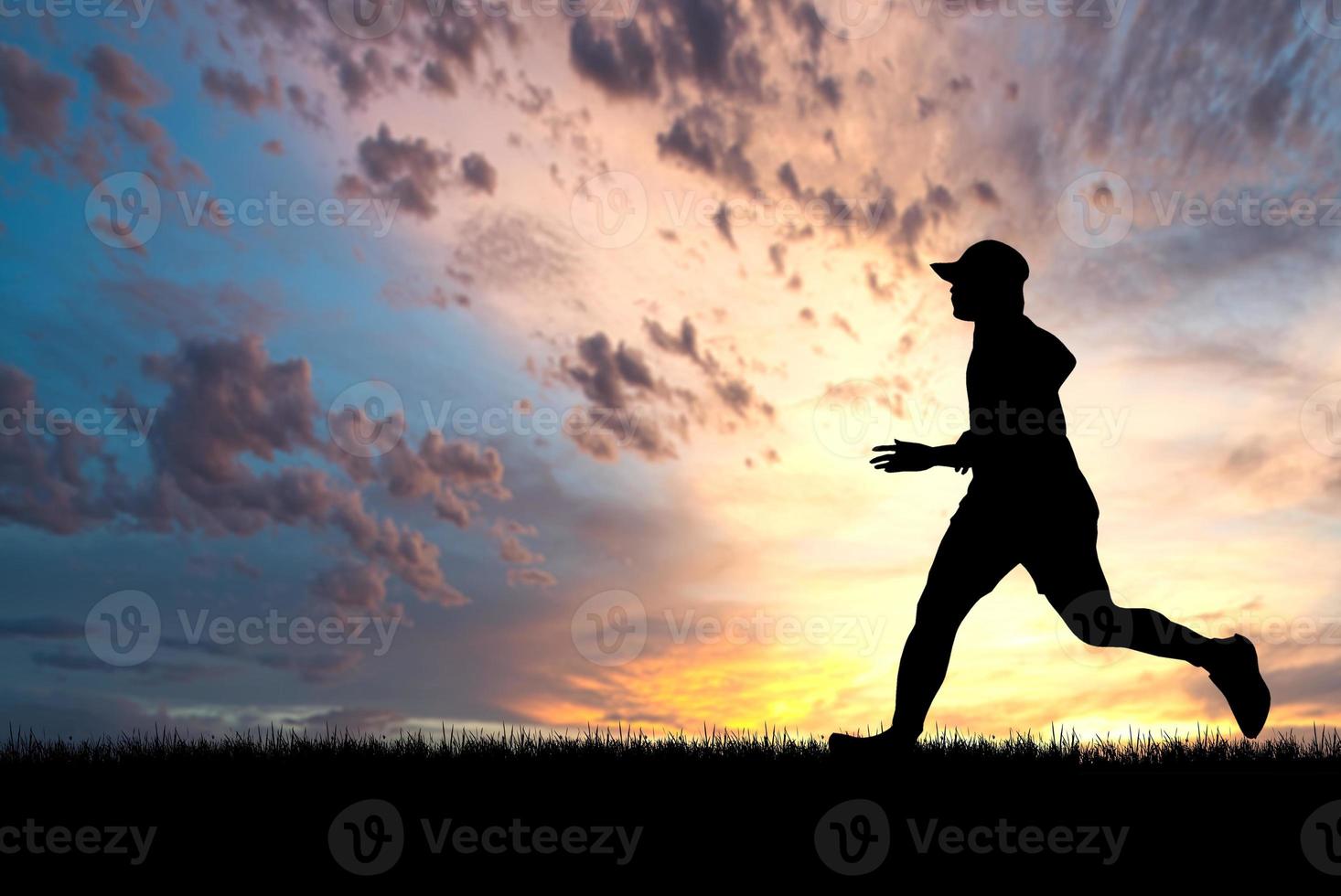 people jogging in the meadow in the evening photo