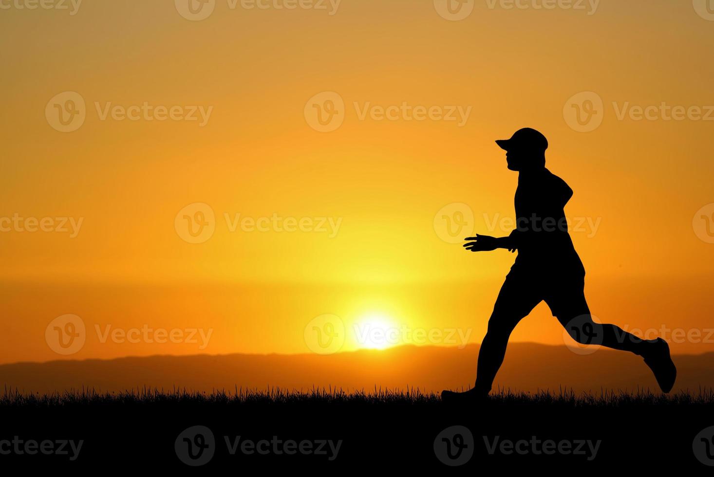 people jogging in the meadow in the evening photo