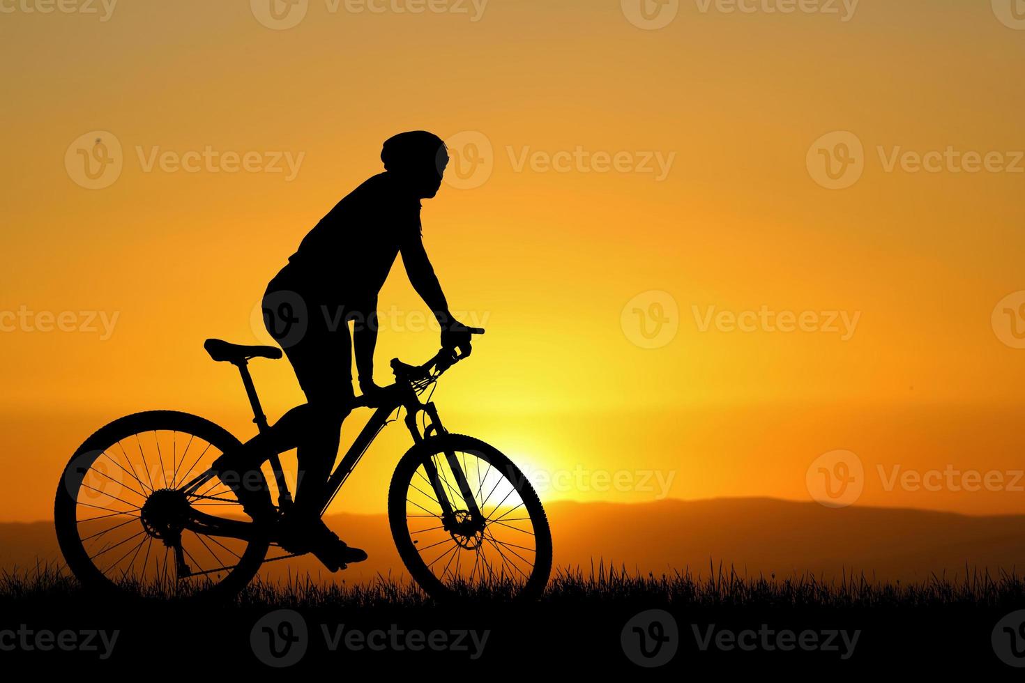 Silhouettes of bikes and cyclists travel concept and exercise by bicycle photo