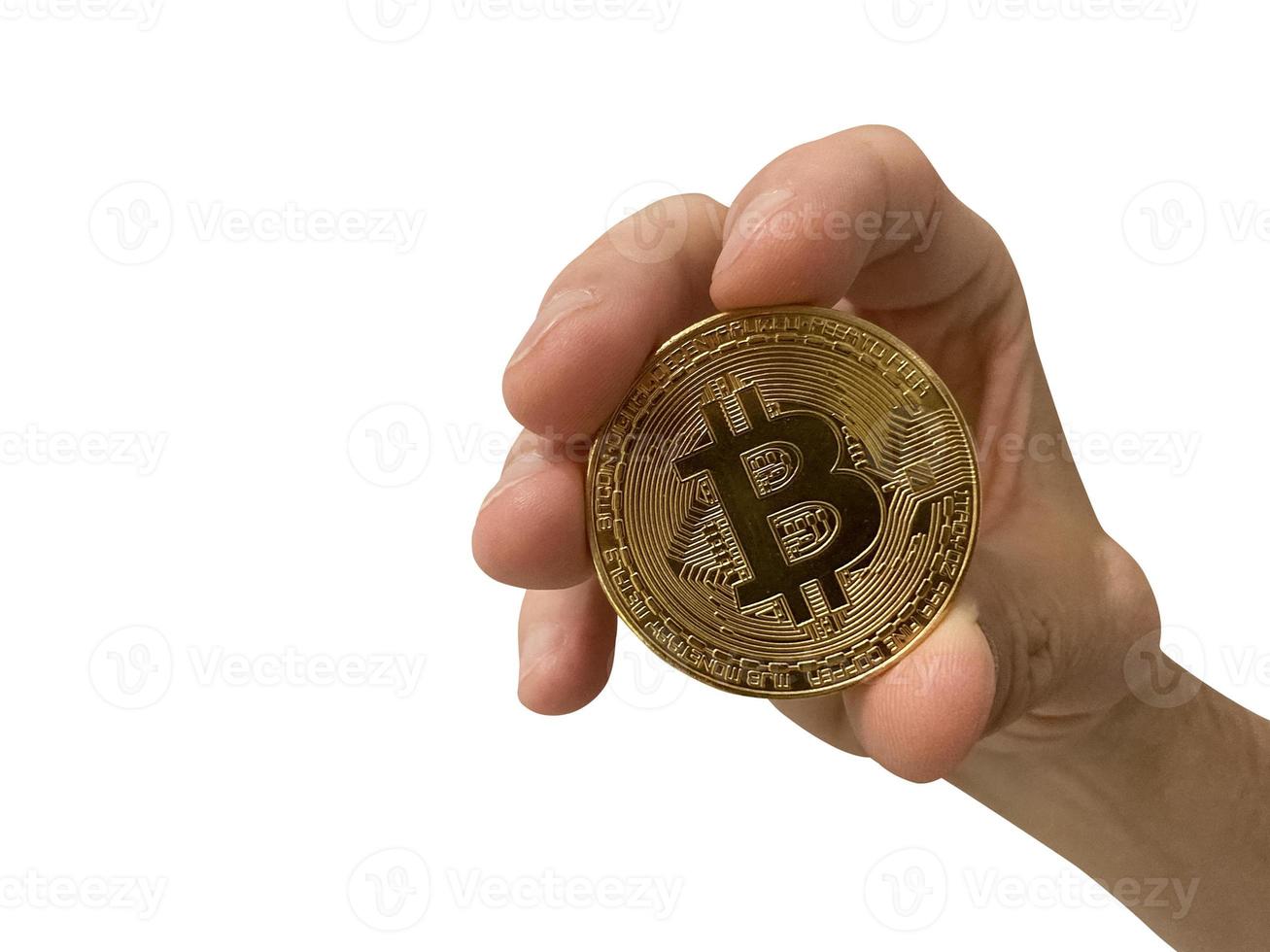 Bitcoin token in woman's hand isolated on white background photo