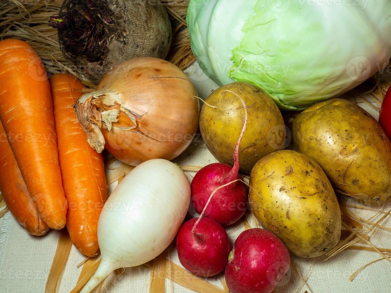 Still life of vegetables. Healthy food. Harvest from the garden.  Borsch set. Harvest root vegetables on the table photo