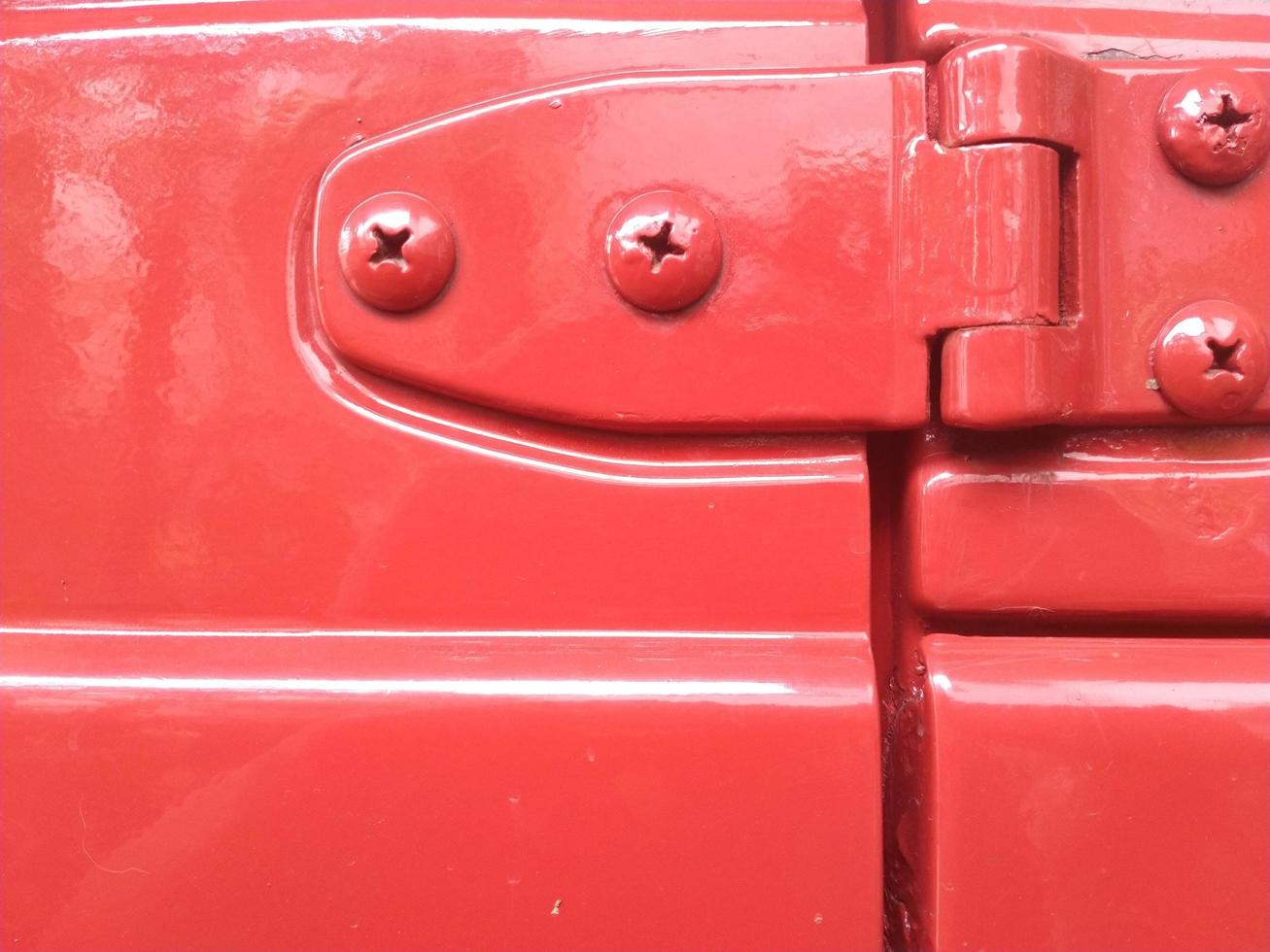 red old car door hinges photo