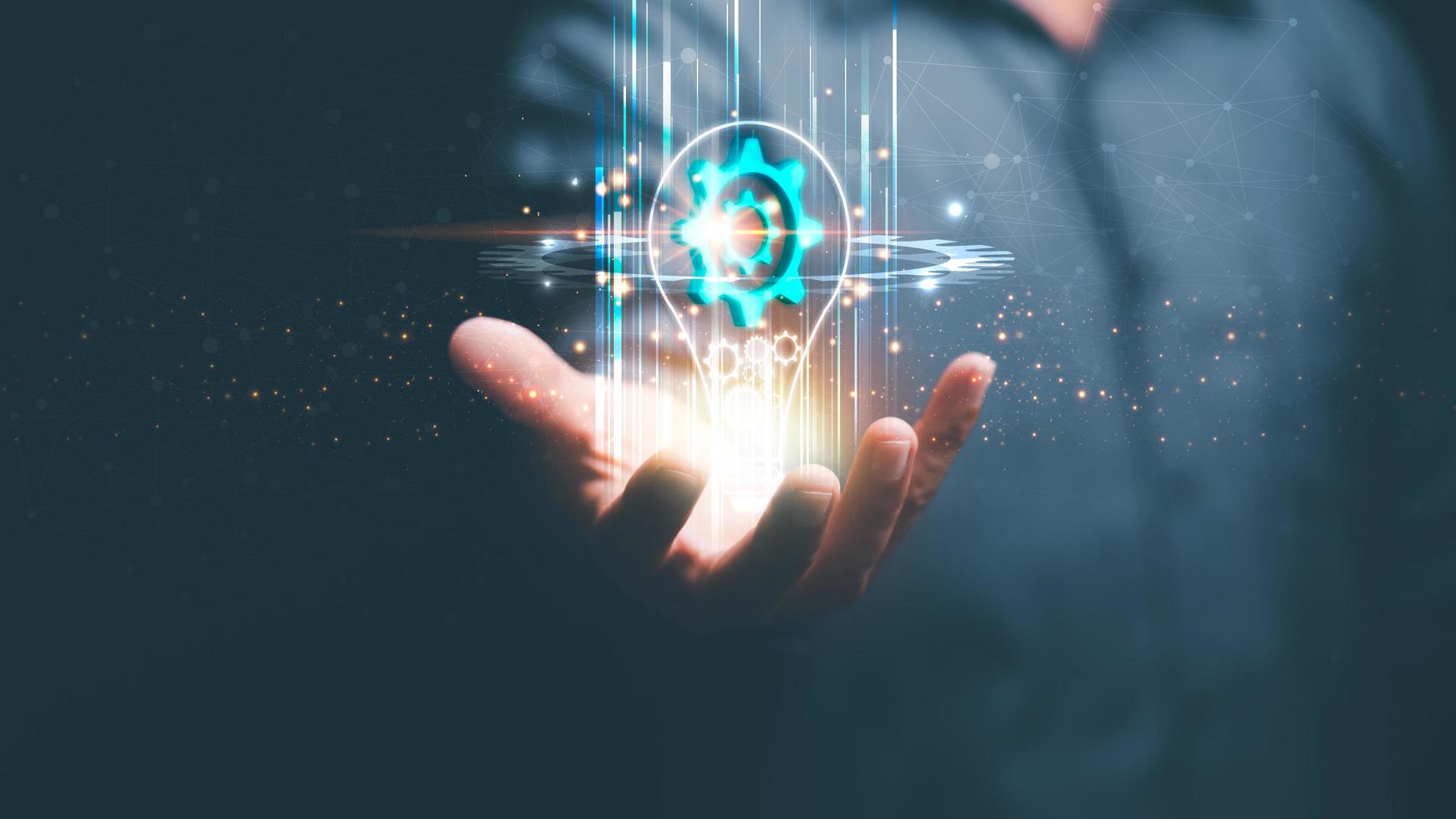 innovative and inspirational concept,Technology creativity for future inventions and developments,Business for innovative solution concept,businessman holding a light bulb icon photo