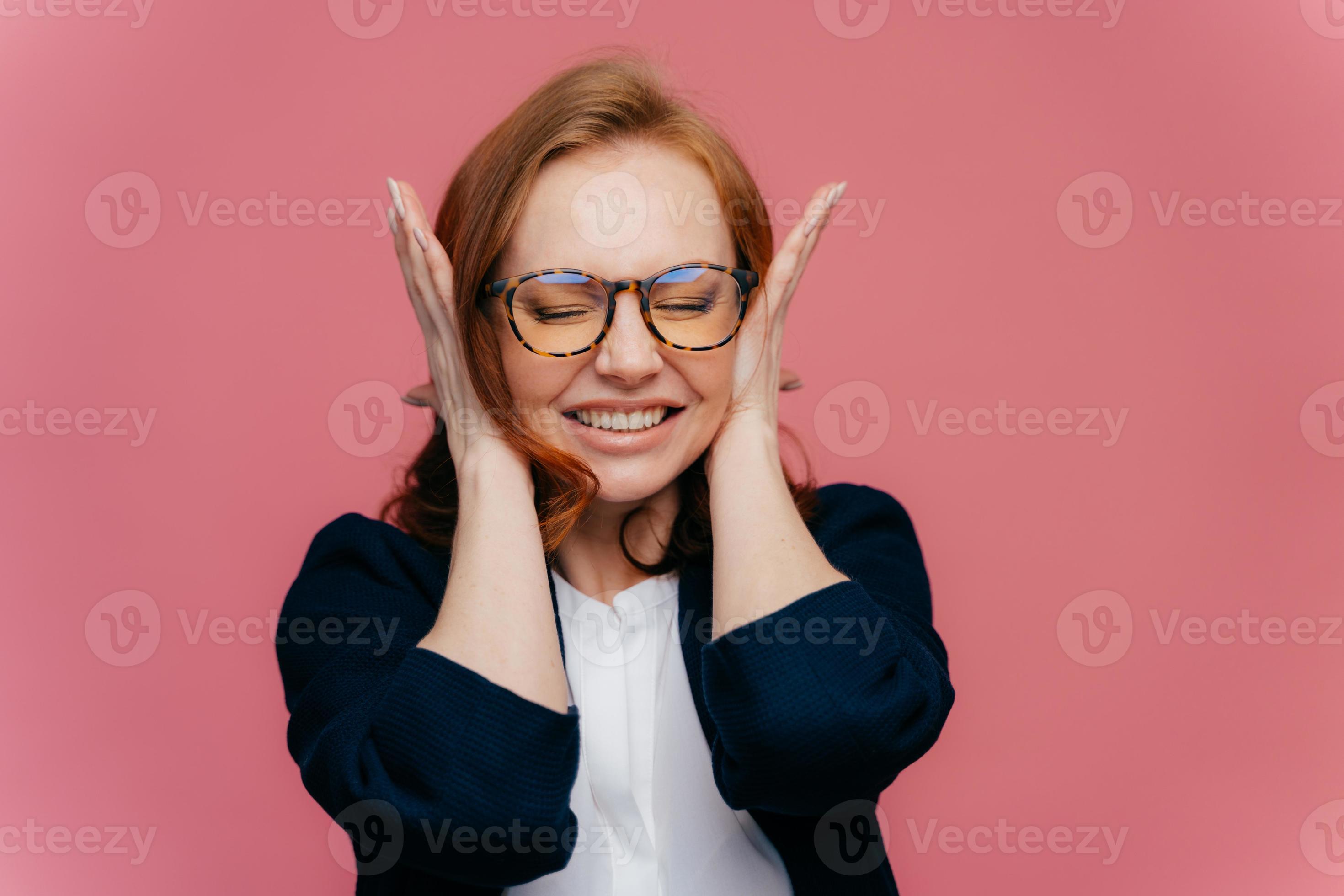Stressed female teacher covers ears, has headache because of noisy pupils, clenches teeth