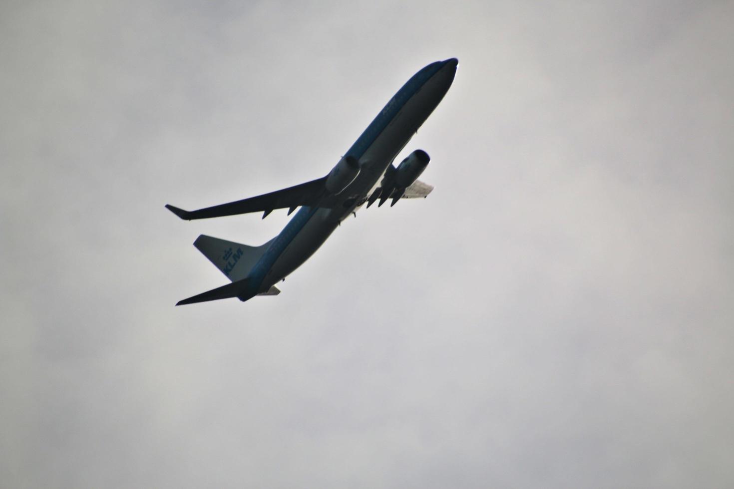 manchester-in-the-uk-in-october-2022-a-plane-taking-off-from