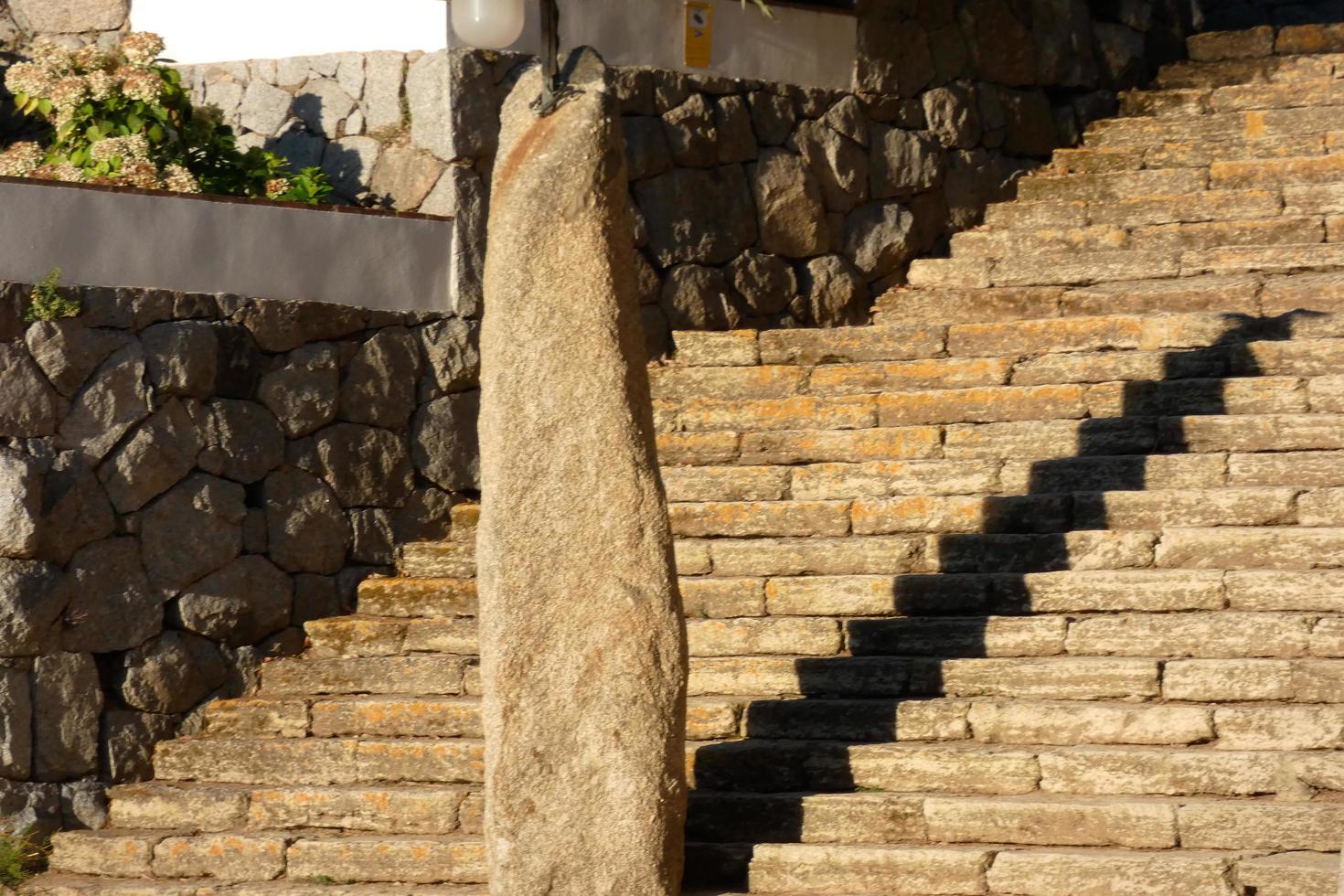 Menir on the coastal path of the Costa brava in the town of S'Agaro photo