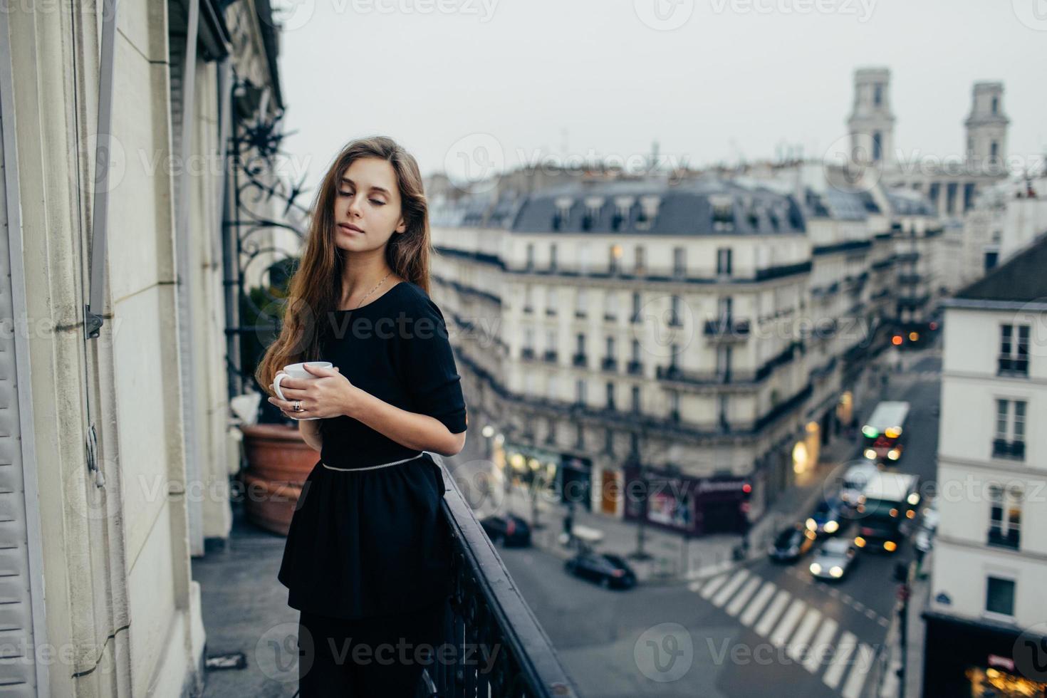 Sensual woman on balcony photo