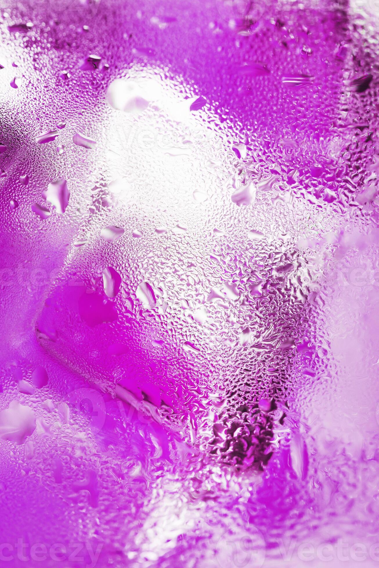 Ice Cubes In A Misted Glass With Drops Of Ice Water Close up Macro ice-cubes-in-a-misted-glass-with-drops-of-ice-water-close-up-macro