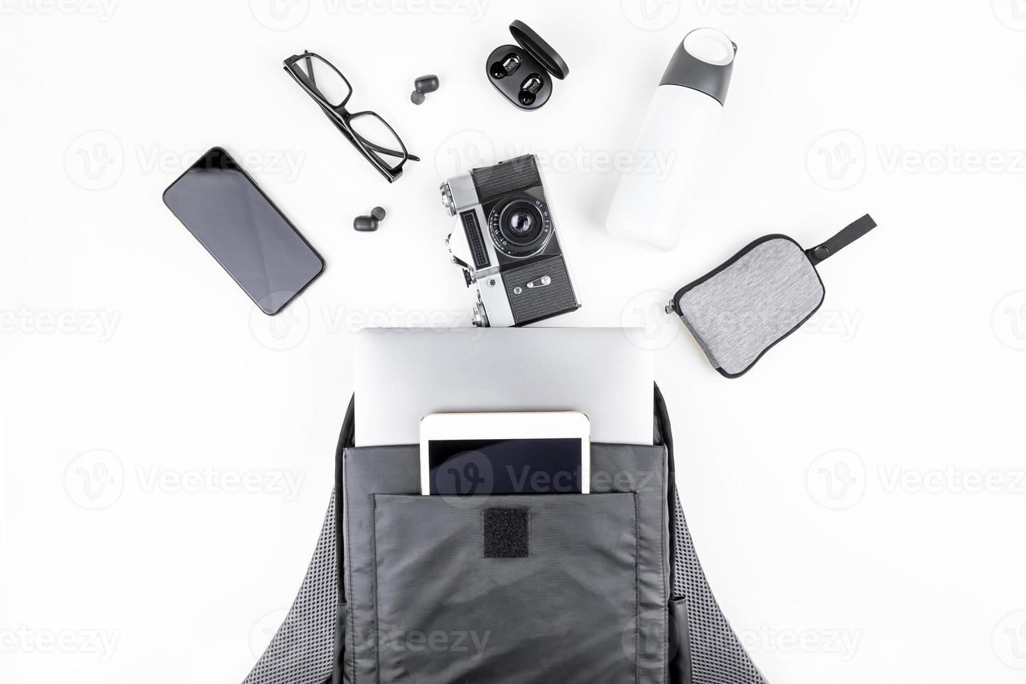 Modern backpack with laptop and tablet inside photo