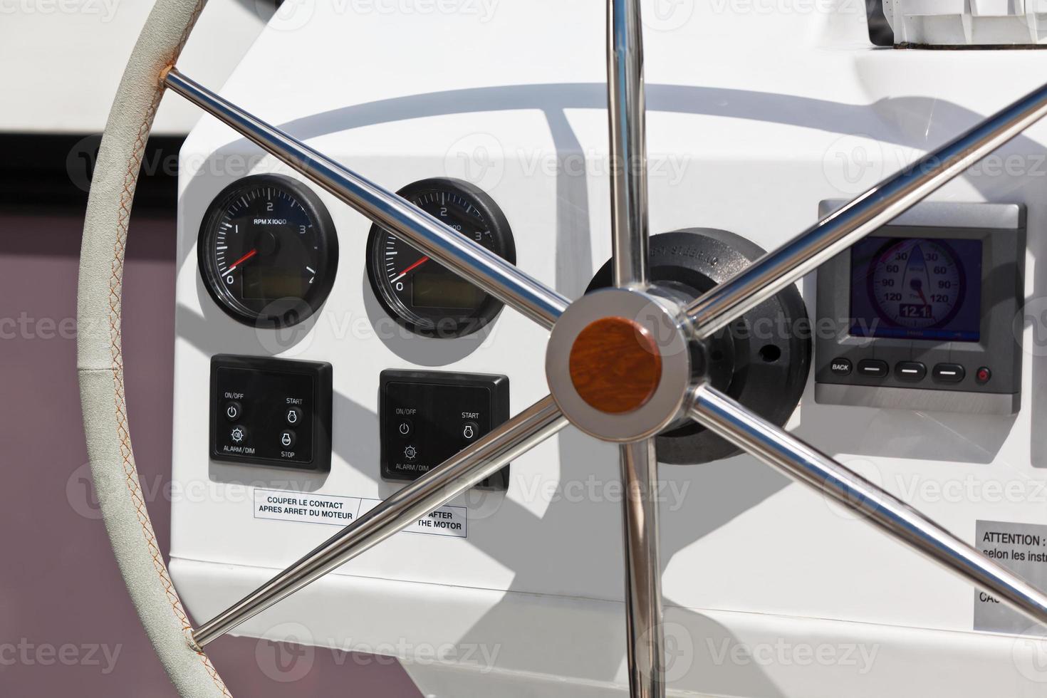 Sailing yacht control wheel and implement. photo