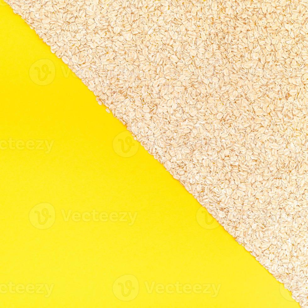 Top view of oatmeal flakes in minimal style photo