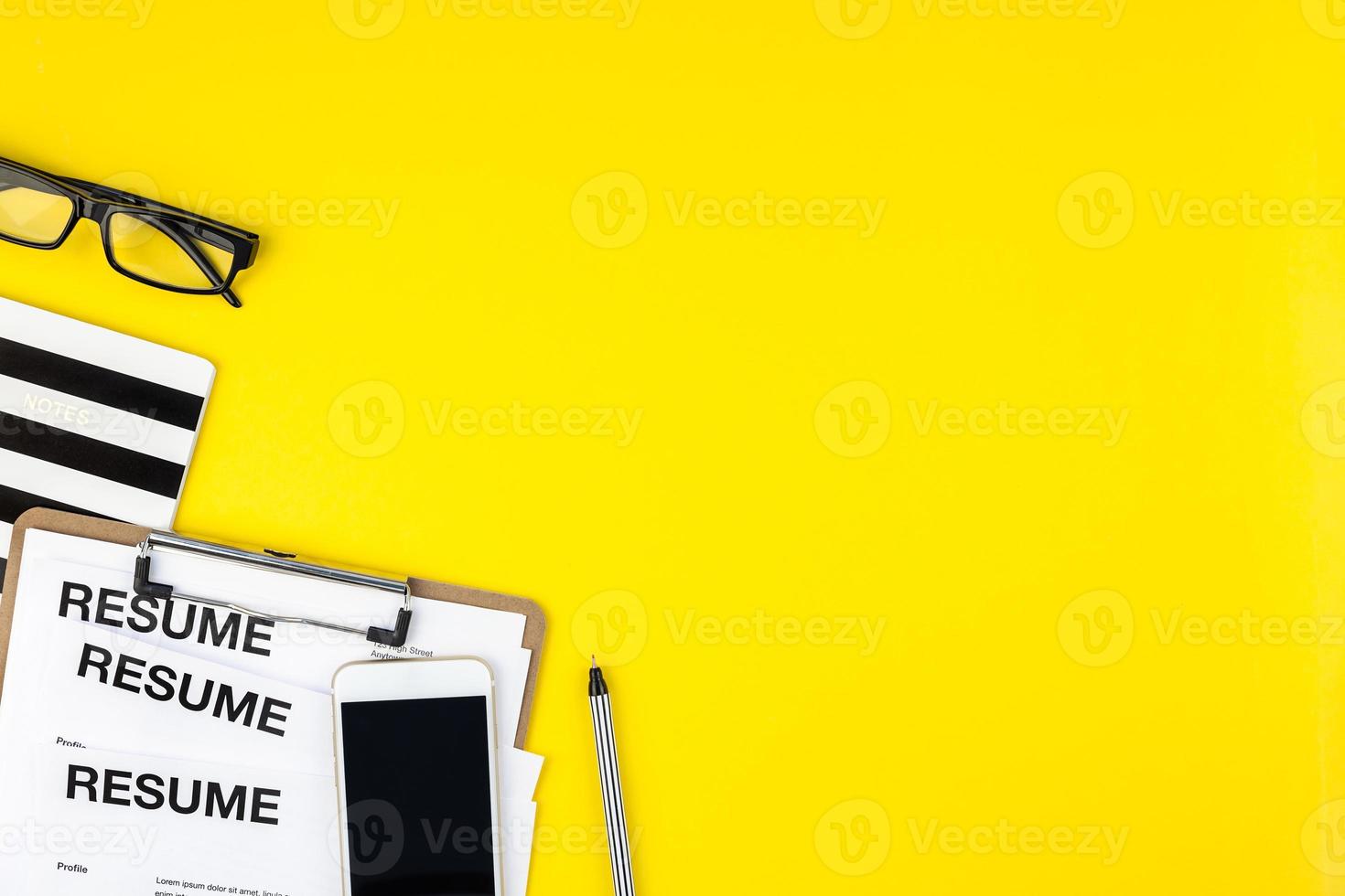We are hiring flat lay on yellow background photo