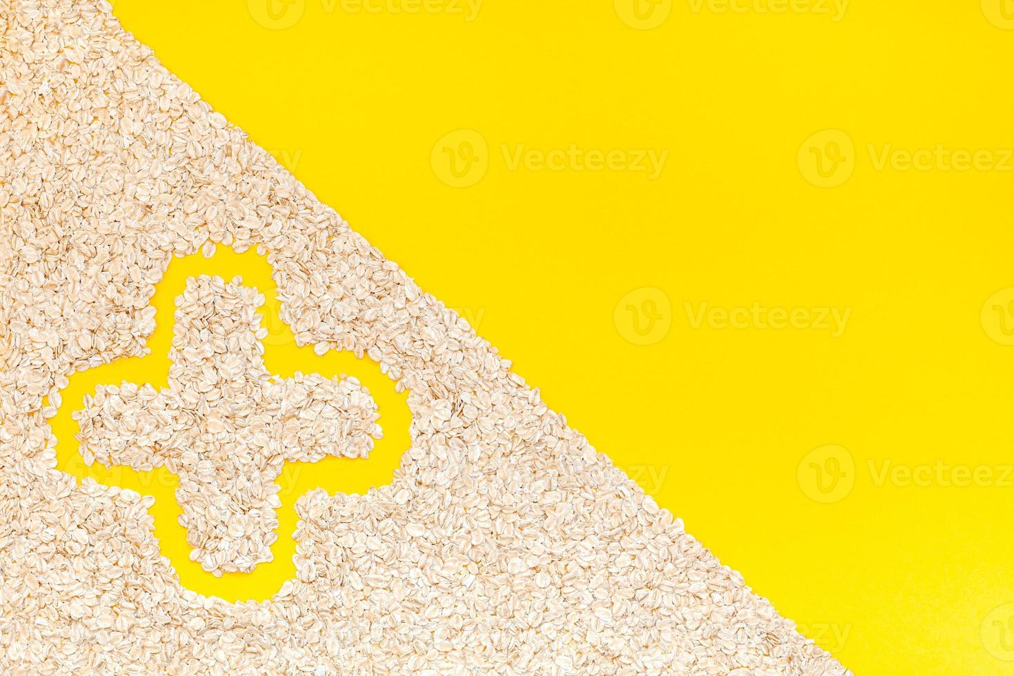 Top view of oatmeal flakes in minimal style photo