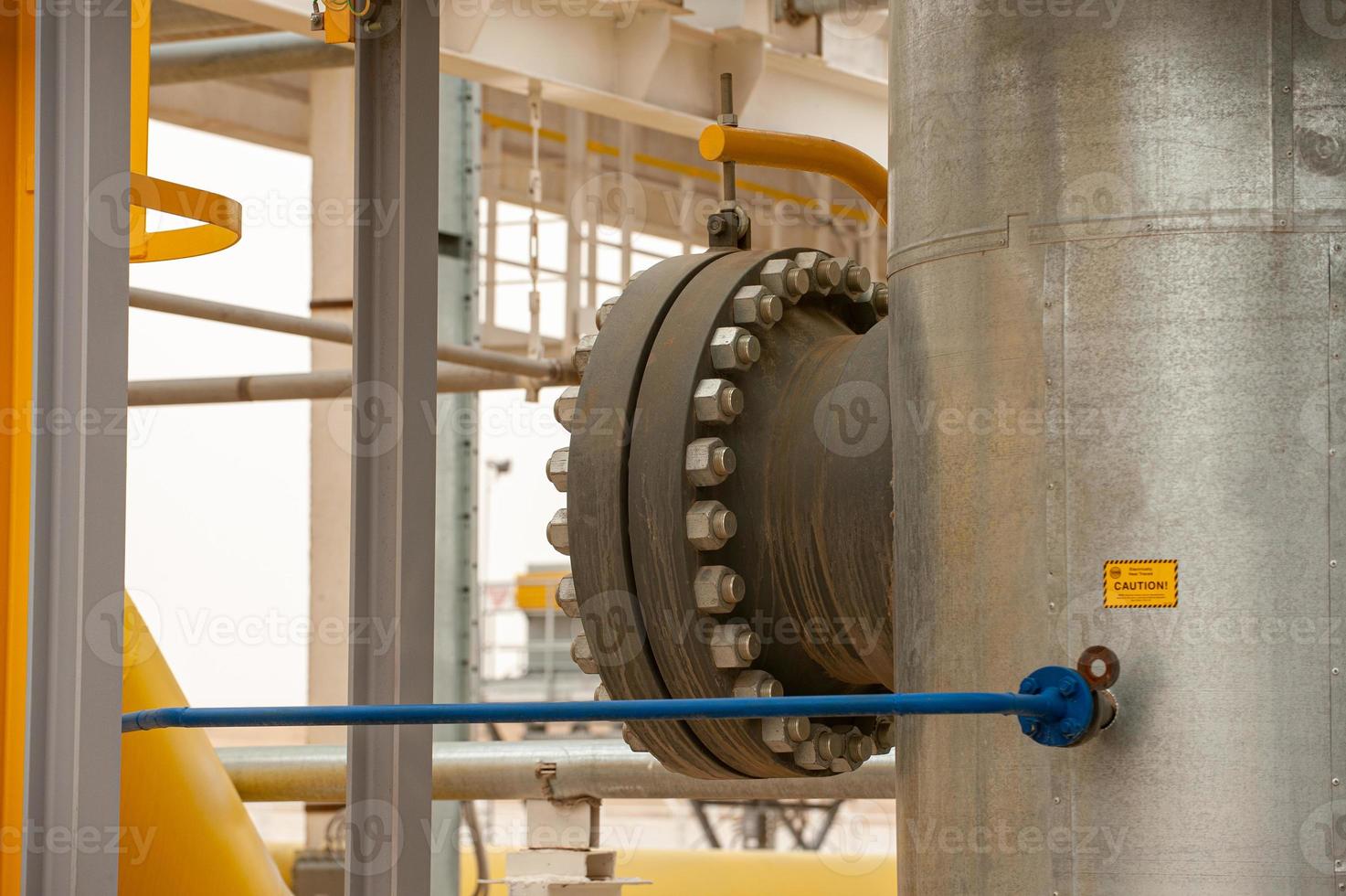 A closeup of pipelines in oil and gas engineering and industrial construction photo