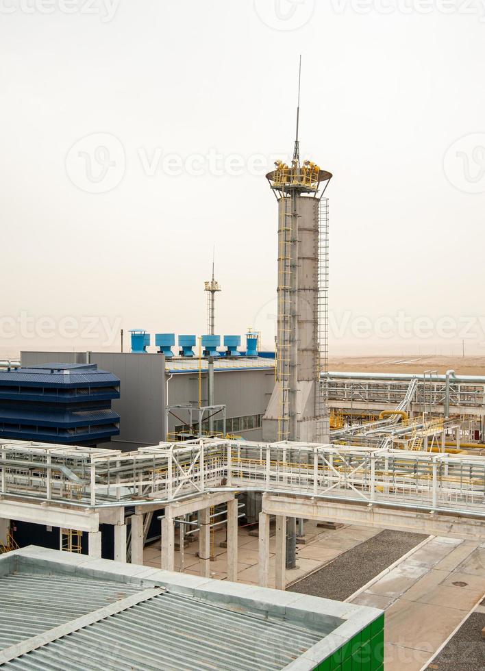 An oil and gas engineering and industrial construction. Panorama of the factory photo