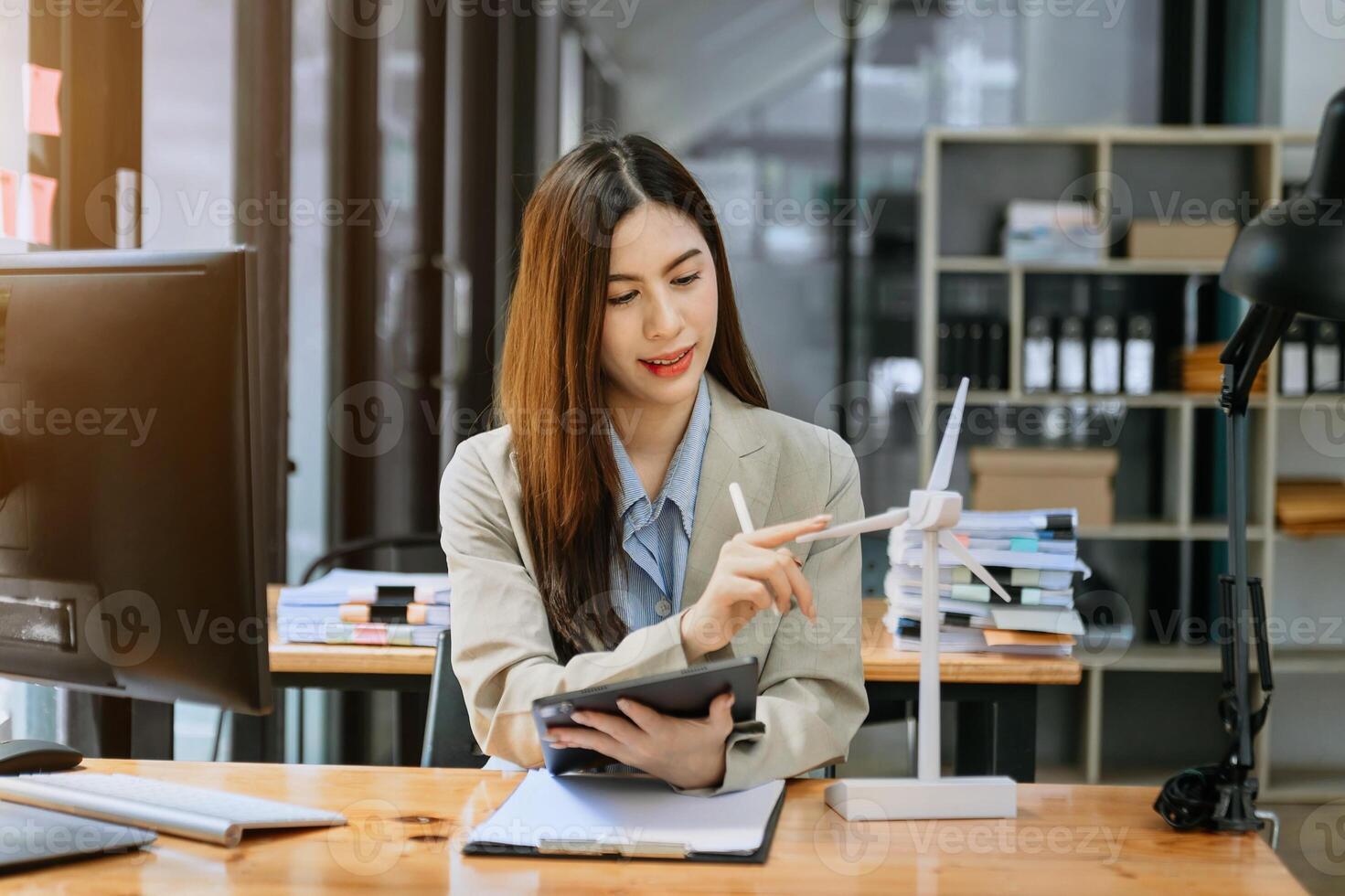 Business Asian woman working with reduce CO2 concept with icons, global warming such as reforest green factory recycle and zero carbon dioxide emission concept. photo