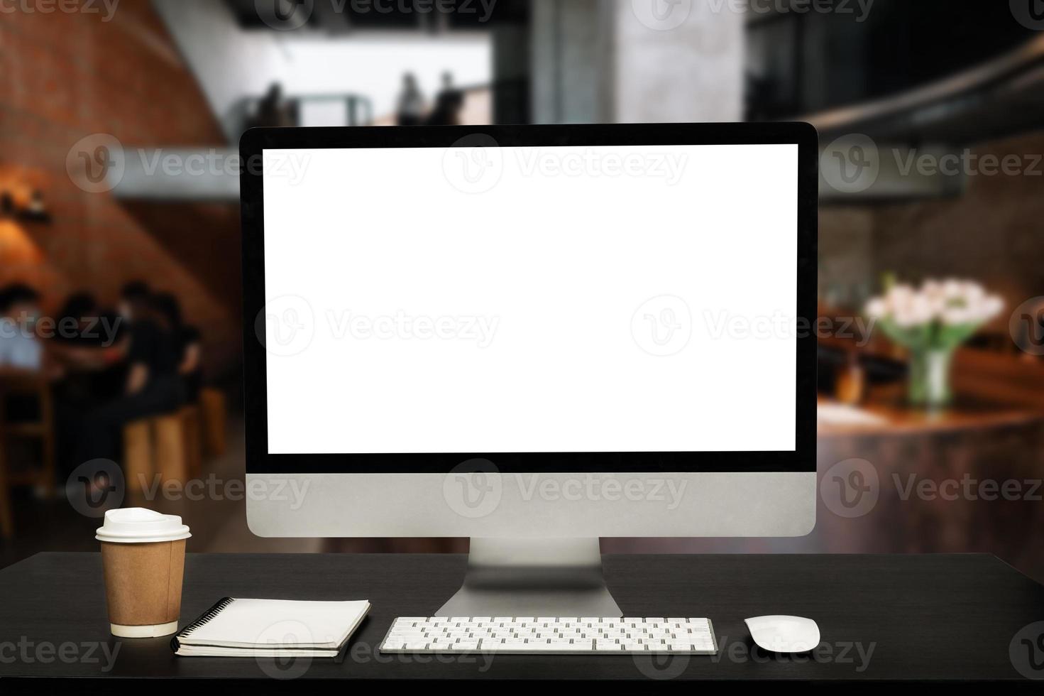 workspace with computer, laptop, office supplies, and coffee cup, smartphone, and tablet at office. desk work concept. photo