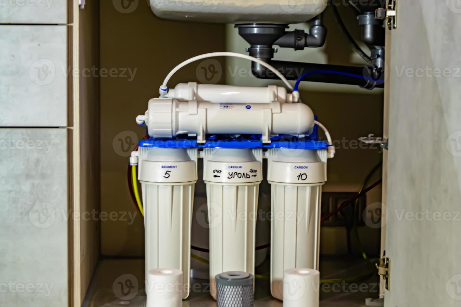 water filter system for home on background kitchen photo